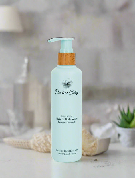 Blue bottle of Timeless Baby hair and body wash with pump 