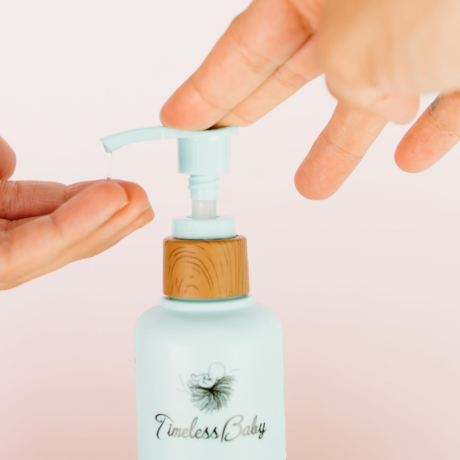 body wash being dispensed from a bottle
