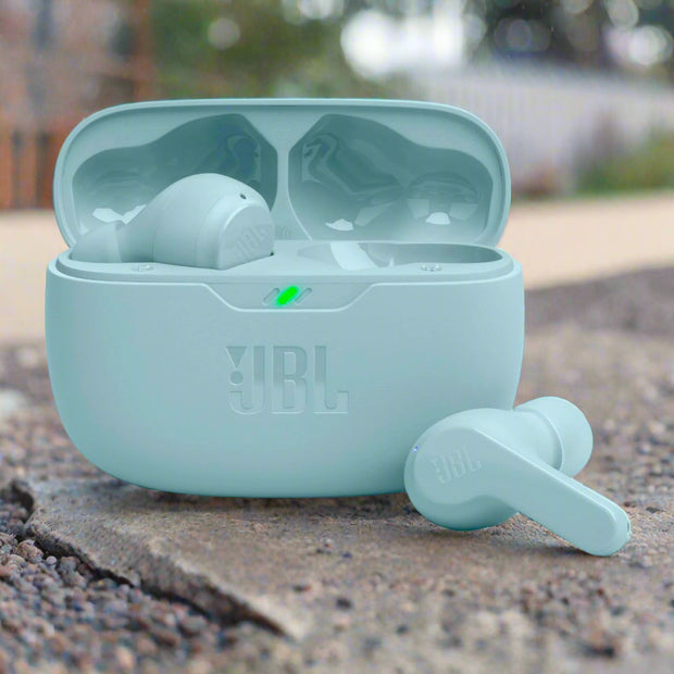Blue JBL wireless earbuds with charging case