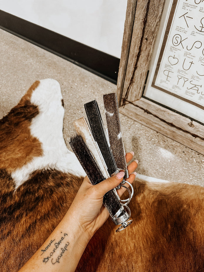 Mooving On Cowhide Wristlet