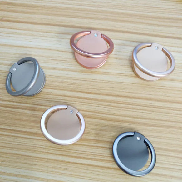 Five phone ring holders in different colors